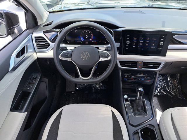 new 2025 Volkswagen Taos car, priced at $28,496