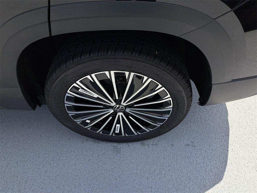 new 2025 Volkswagen Taos car, priced at $26,996