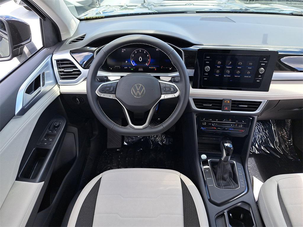 new 2025 Volkswagen Taos car, priced at $26,996