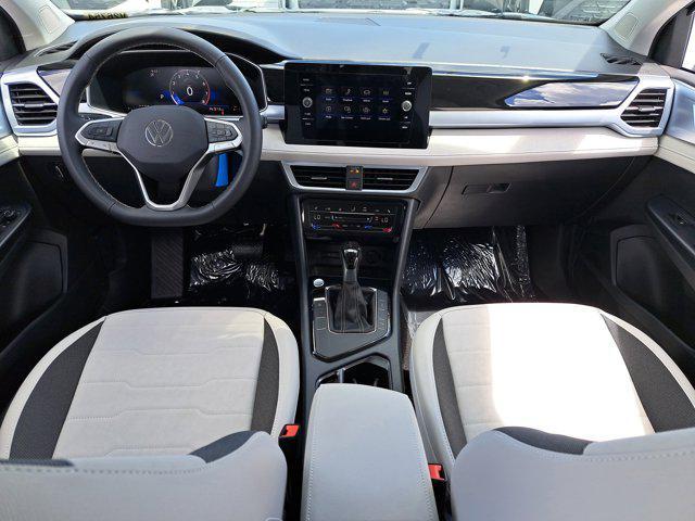 new 2025 Volkswagen Taos car, priced at $28,496