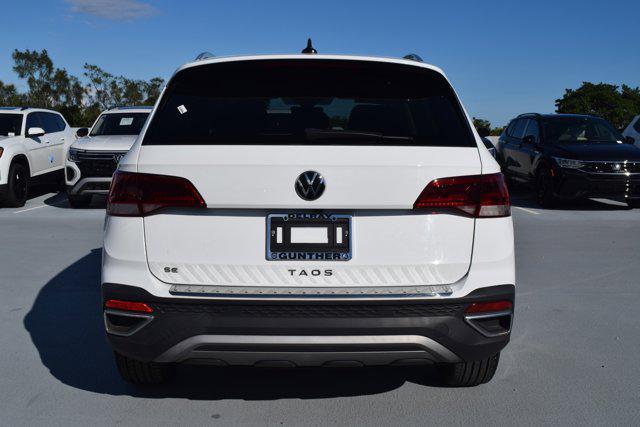 used 2022 Volkswagen Taos car, priced at $19,357