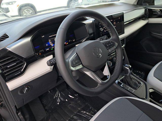 new 2025 Volkswagen Taos car, priced at $25,864