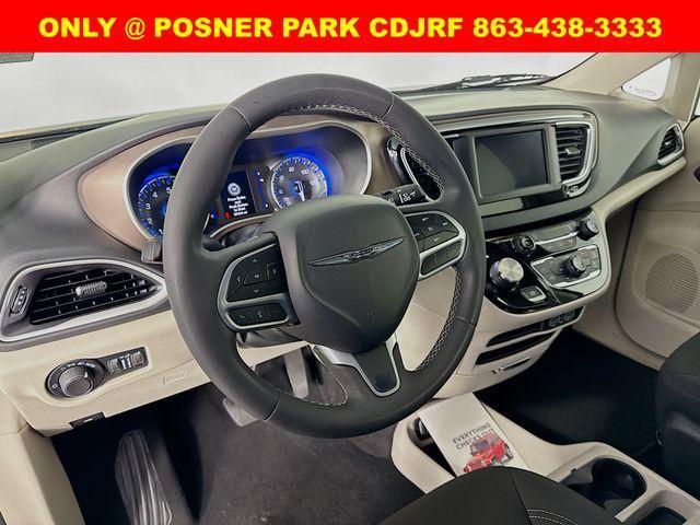 used 2023 Chrysler Voyager car, priced at $21,200