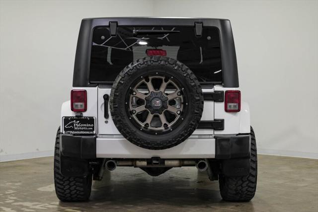 used 2015 Jeep Wrangler Unlimited car, priced at $23,990