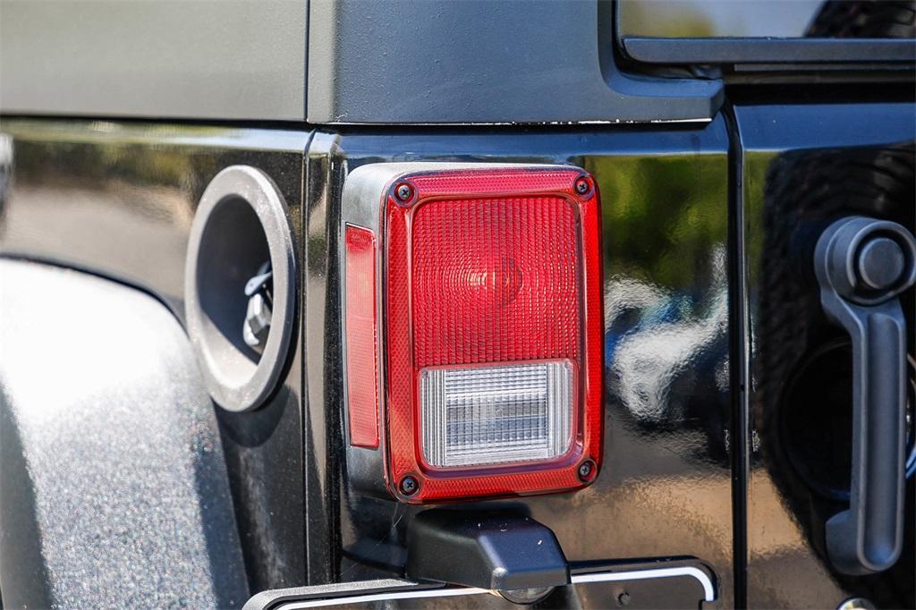 used 2014 Jeep Wrangler Unlimited car, priced at $17,923