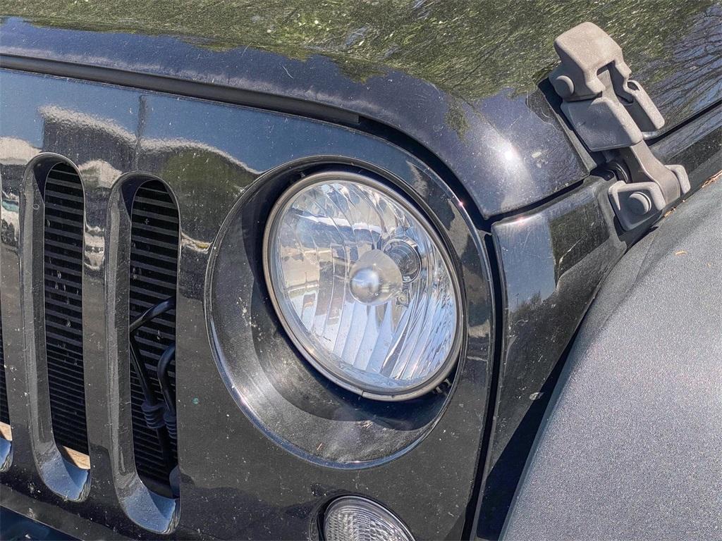 used 2014 Jeep Wrangler Unlimited car, priced at $17,923