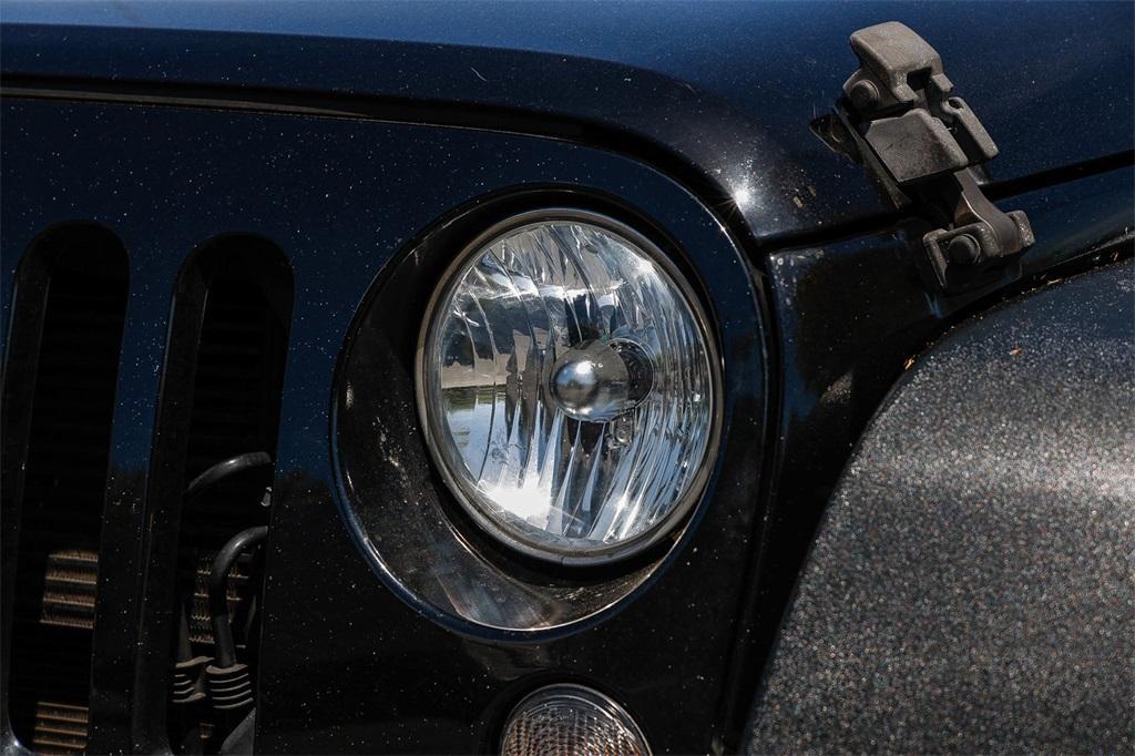 used 2014 Jeep Wrangler Unlimited car, priced at $17,923