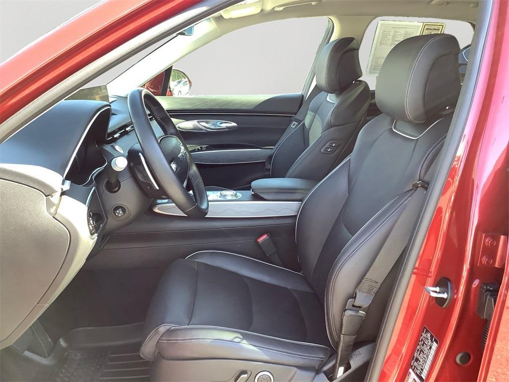 used 2023 Genesis GV70 car, priced at $32,940
