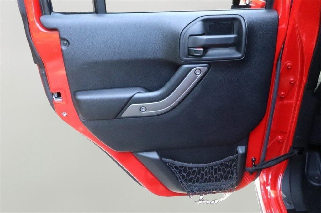 used 2015 Jeep Wrangler Unlimited car, priced at $14,540