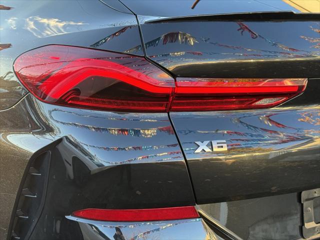 used 2021 BMW X6 car, priced at $39,855