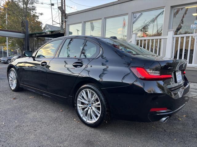 used 2023 BMW 330 car, priced at $28,755