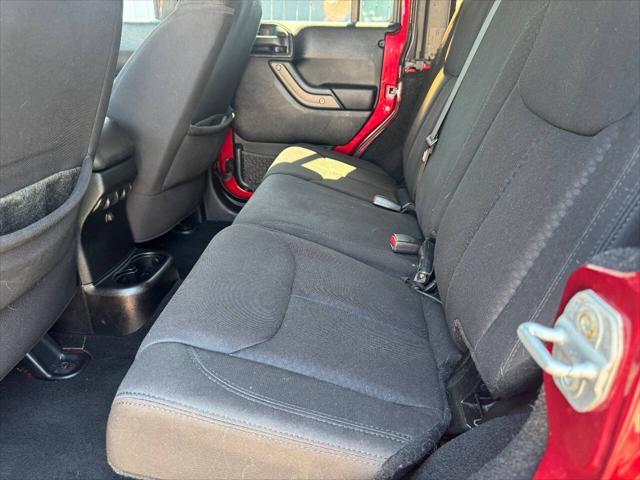 used 2013 Jeep Wrangler Unlimited car, priced at $13,995