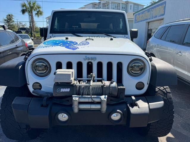 used 2012 Jeep Wrangler Unlimited car, priced at $14,990