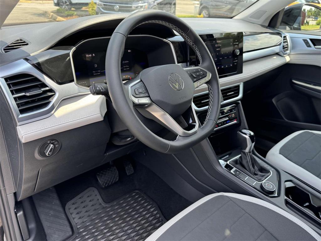 new 2025 Volkswagen Taos car, priced at $30,621