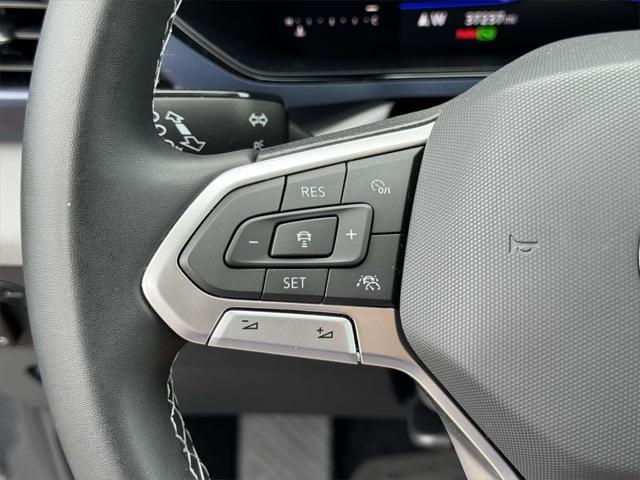 used 2023 Volkswagen Taos car, priced at $22,481