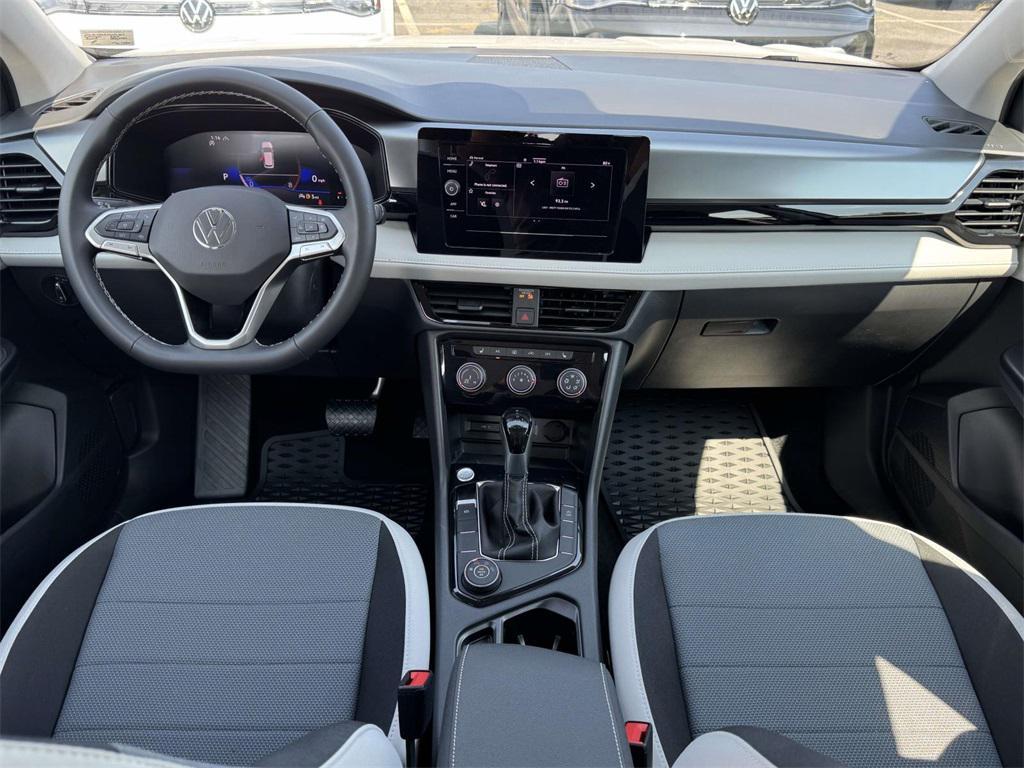 new 2025 Volkswagen Taos car, priced at $27,021