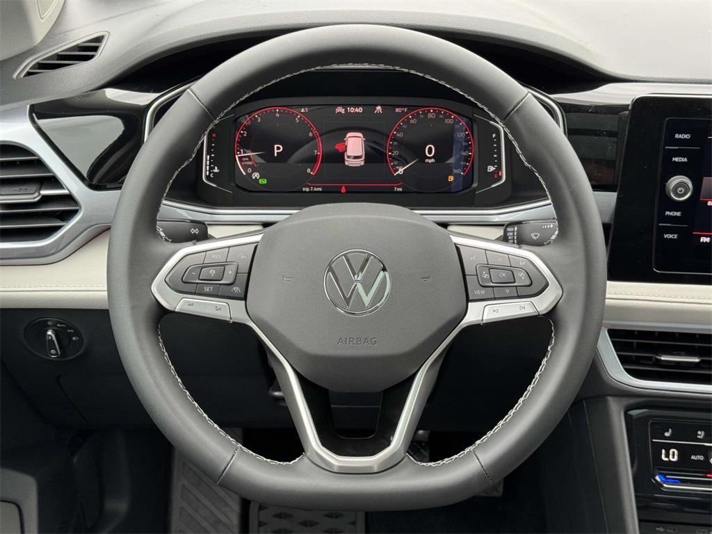 new 2025 Volkswagen Taos car, priced at $33,011