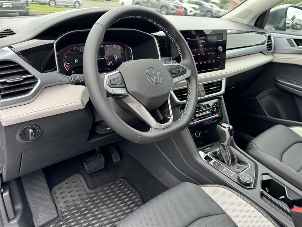 new 2025 Volkswagen Taos car, priced at $33,011