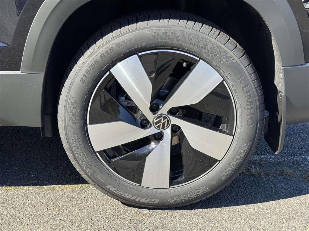 new 2025 Volkswagen Taos car, priced at $27,021