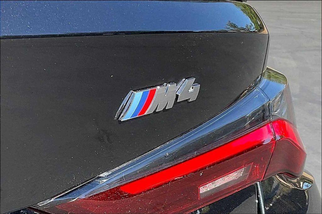 used 2023 BMW M4 car, priced at $78,480