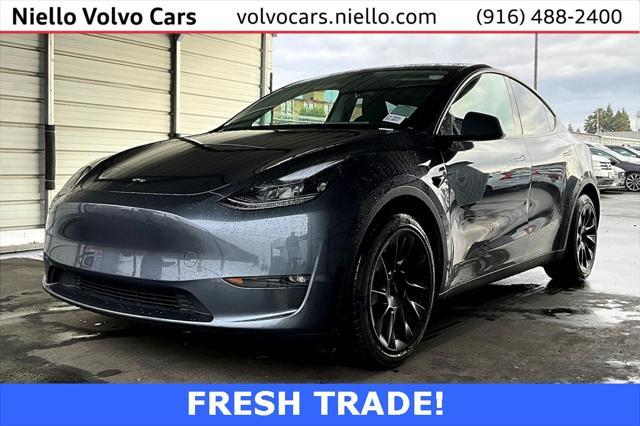 used 2023 Tesla Model Y car, priced at $34,377