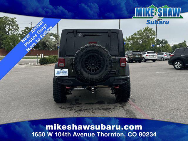 used 2015 Jeep Wrangler Unlimited car, priced at $26,791