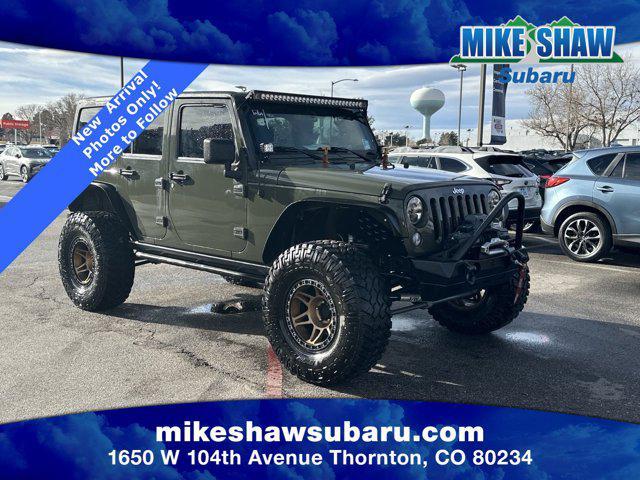 used 2015 Jeep Wrangler Unlimited car, priced at $26,908