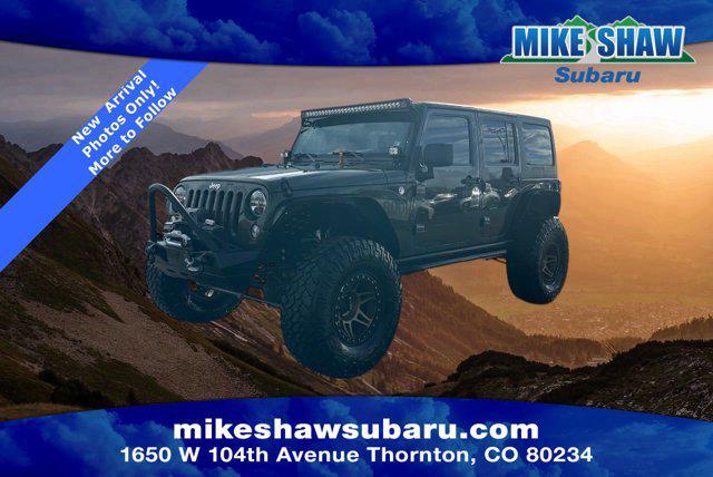 used 2015 Jeep Wrangler Unlimited car, priced at $26,908