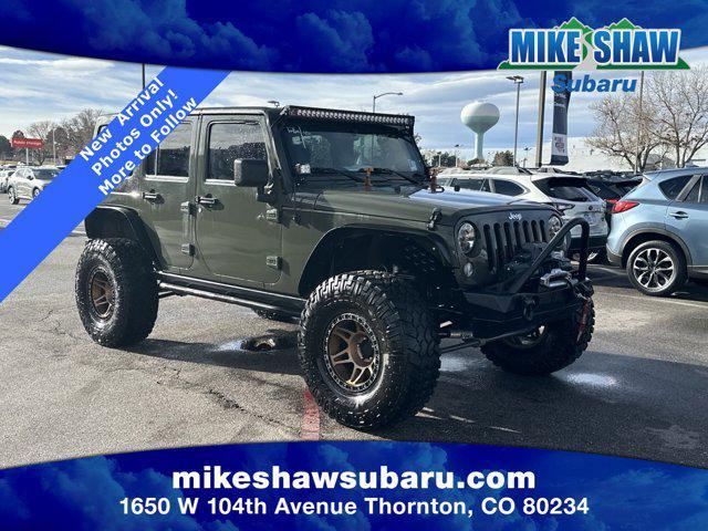 used 2015 Jeep Wrangler Unlimited car, priced at $26,908