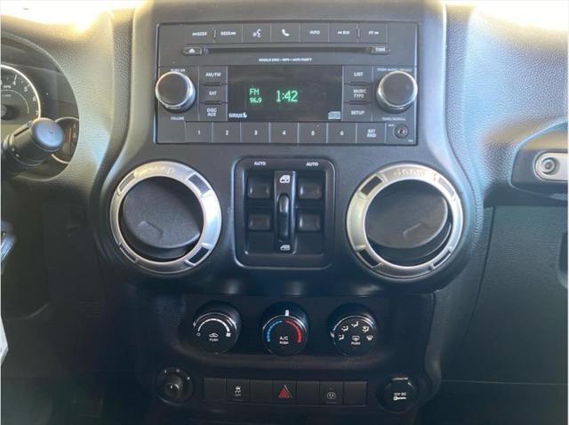 used 2015 Jeep Wrangler Unlimited car, priced at $23,990