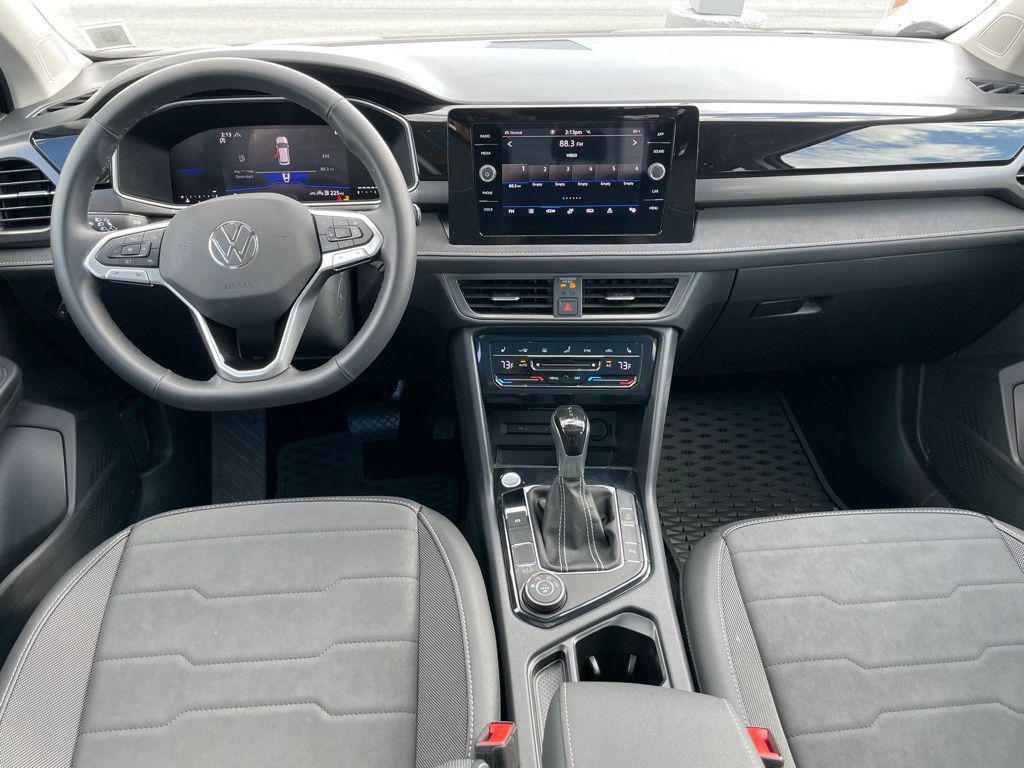 used 2025 Volkswagen Taos car, priced at $30,694