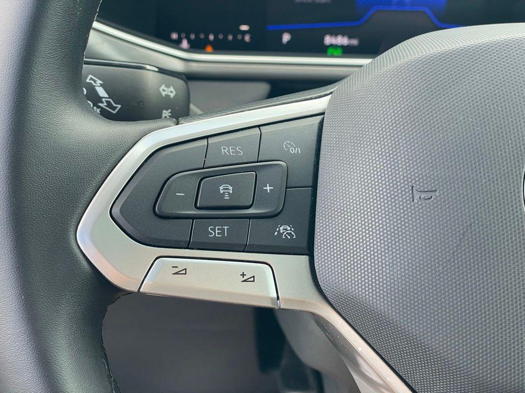 used 2025 Volkswagen Taos car, priced at $30,694