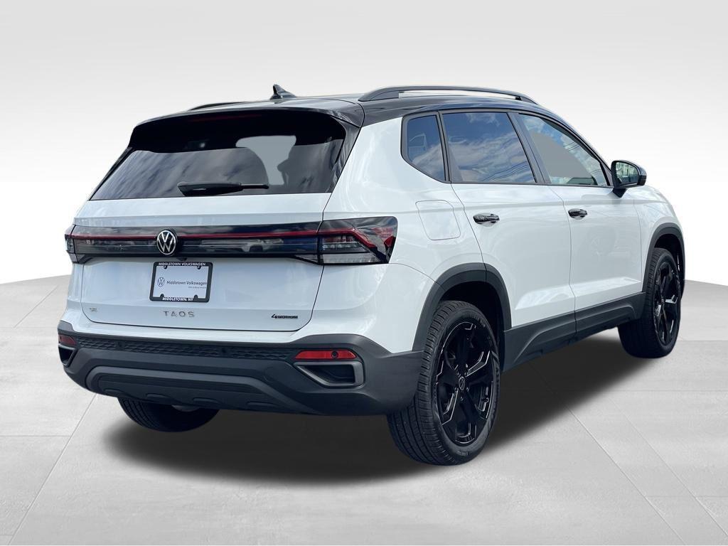 used 2025 Volkswagen Taos car, priced at $30,694