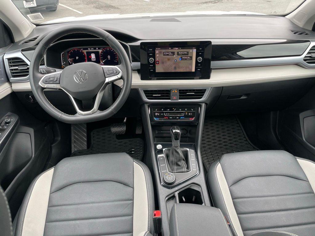 used 2025 Volkswagen Taos car, priced at $31,500