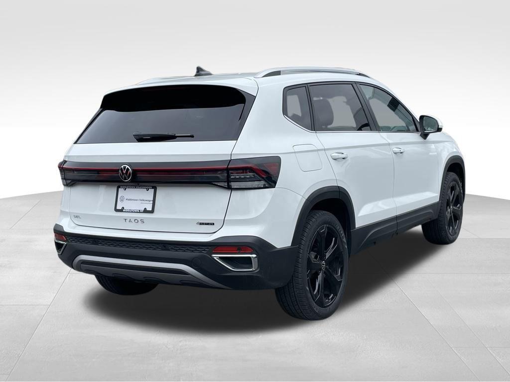 used 2025 Volkswagen Taos car, priced at $31,500