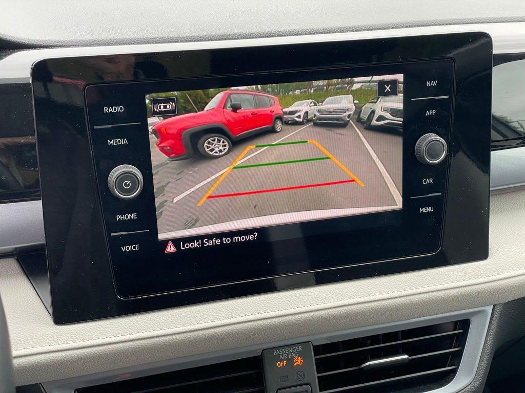 used 2025 Volkswagen Taos car, priced at $31,500