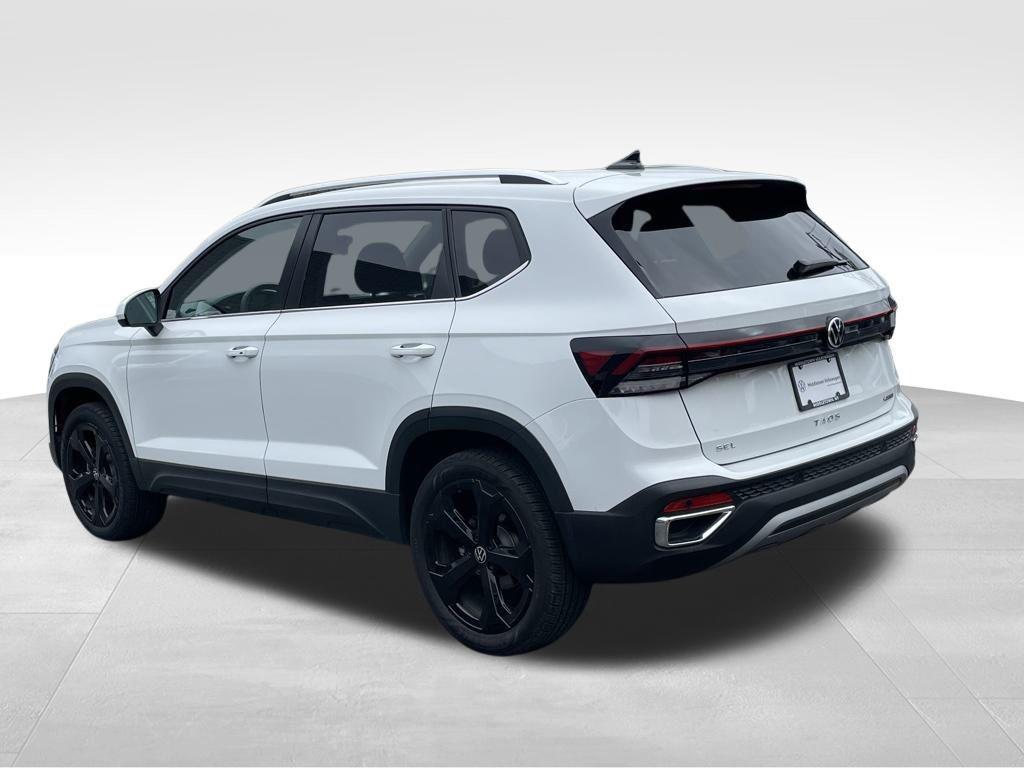 used 2025 Volkswagen Taos car, priced at $31,500