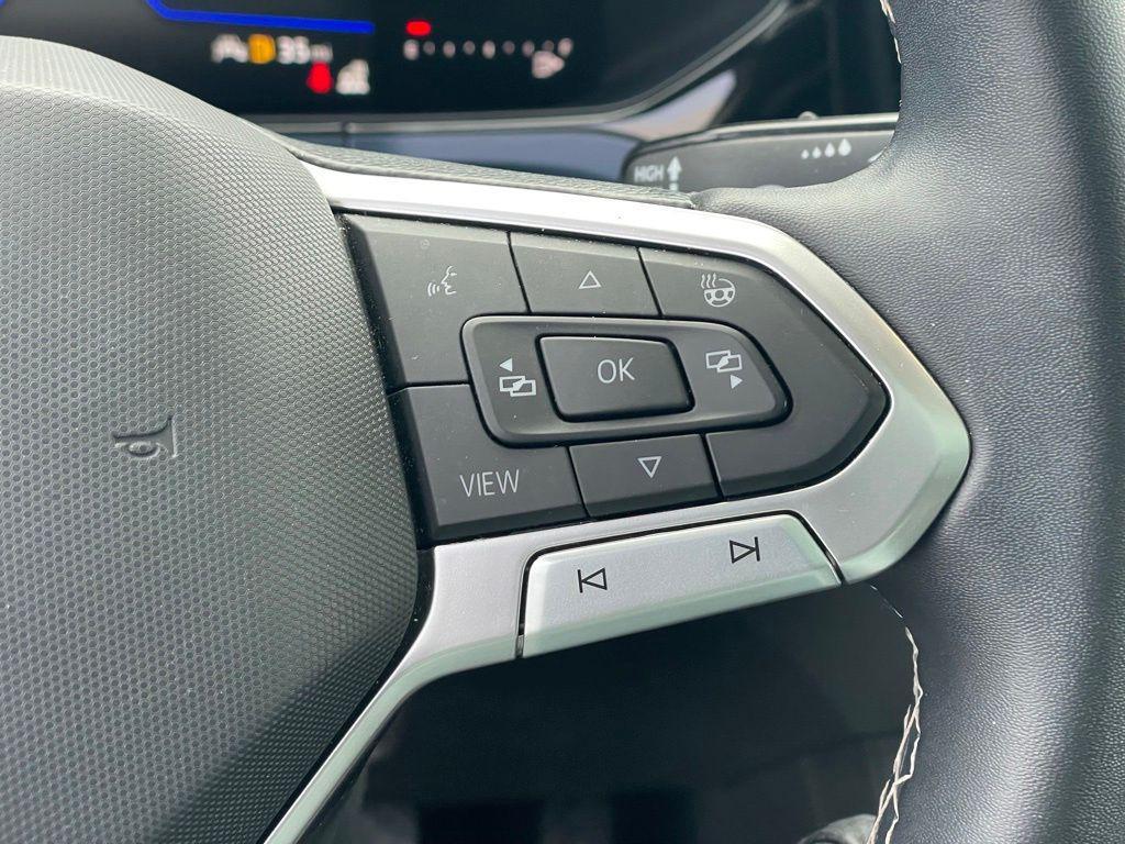 used 2023 Volkswagen Taos car, priced at $19,230