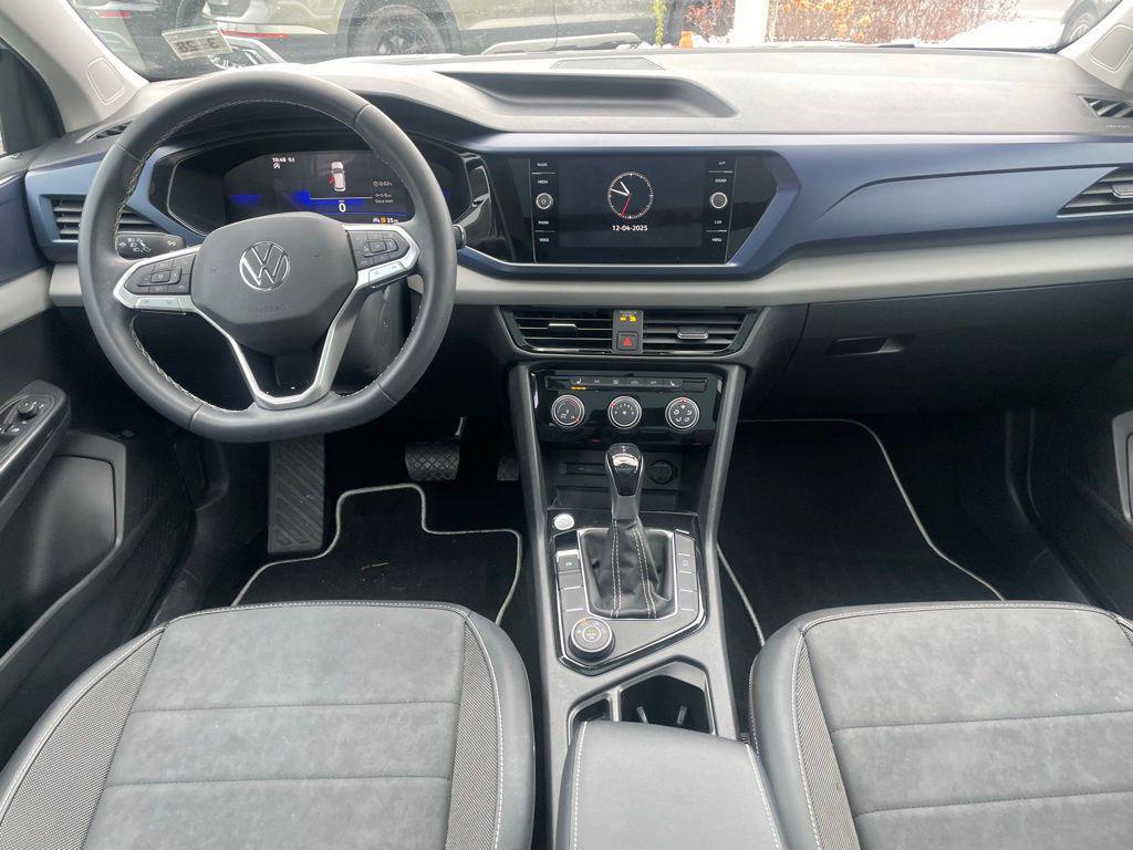 used 2023 Volkswagen Taos car, priced at $19,230