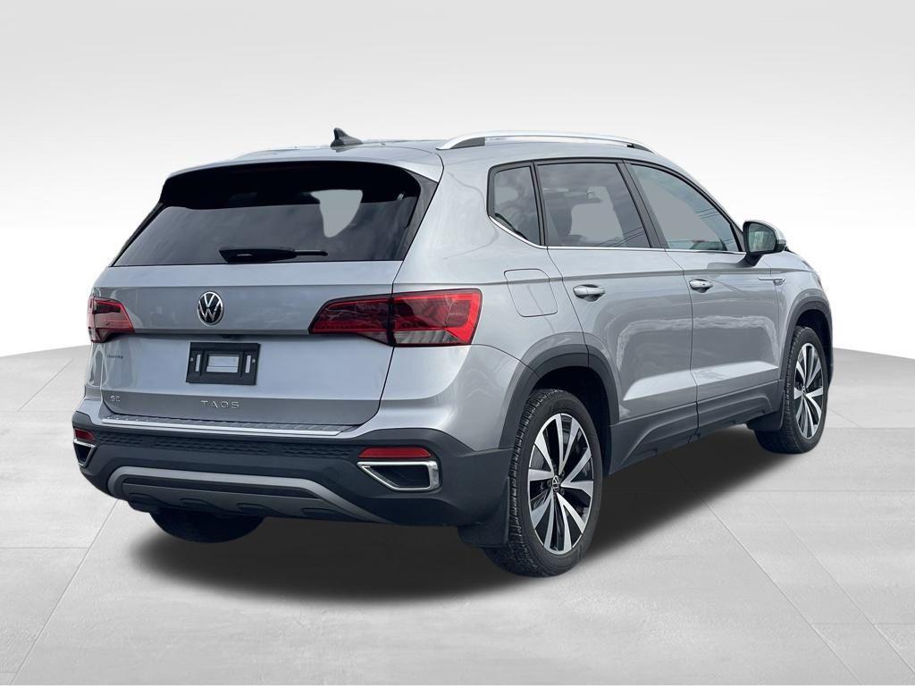 used 2023 Volkswagen Taos car, priced at $19,230