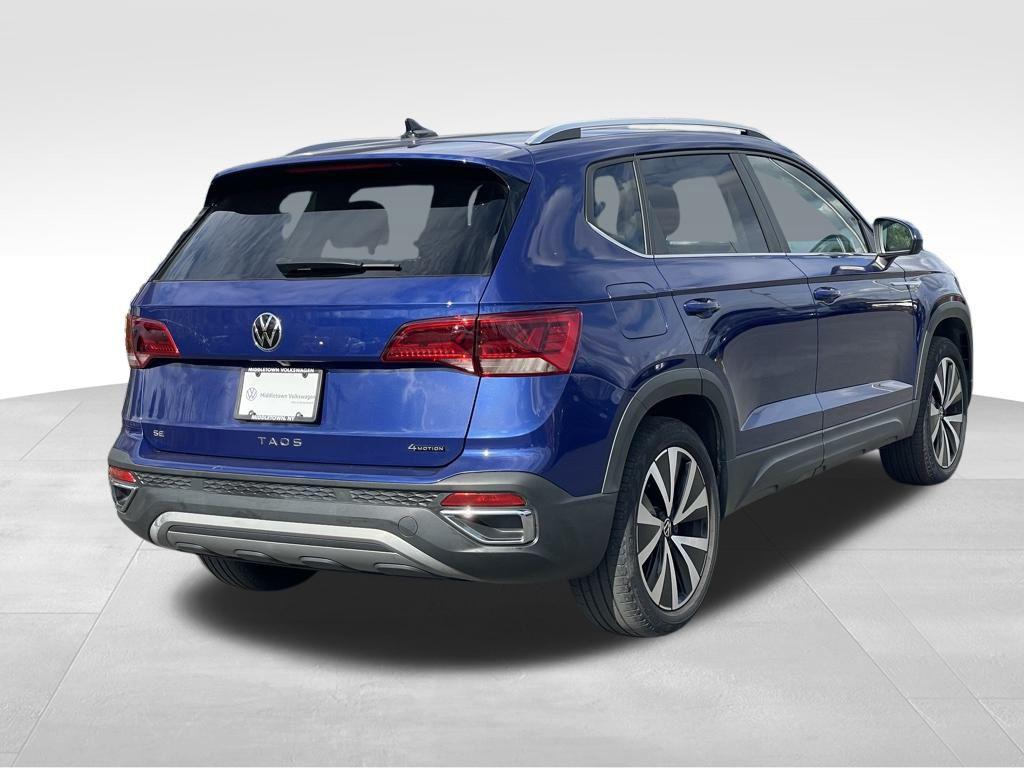 used 2023 Volkswagen Taos car, priced at $22,115