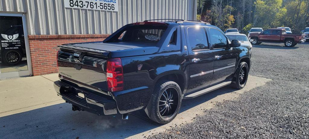 used 2013 Chevrolet Avalanche car, priced at $14,500