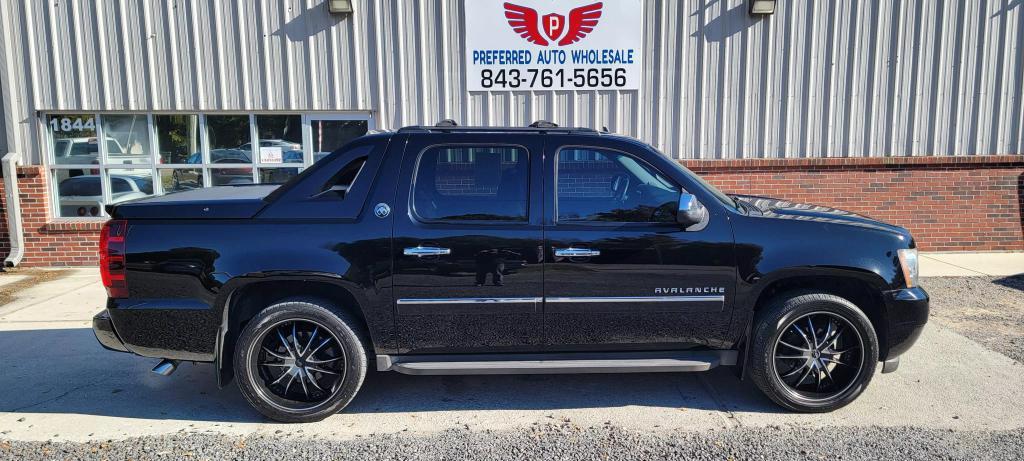 used 2013 Chevrolet Avalanche car, priced at $14,500