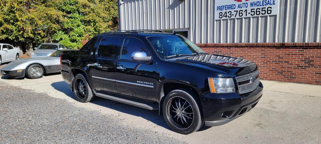 used 2013 Chevrolet Avalanche car, priced at $14,500