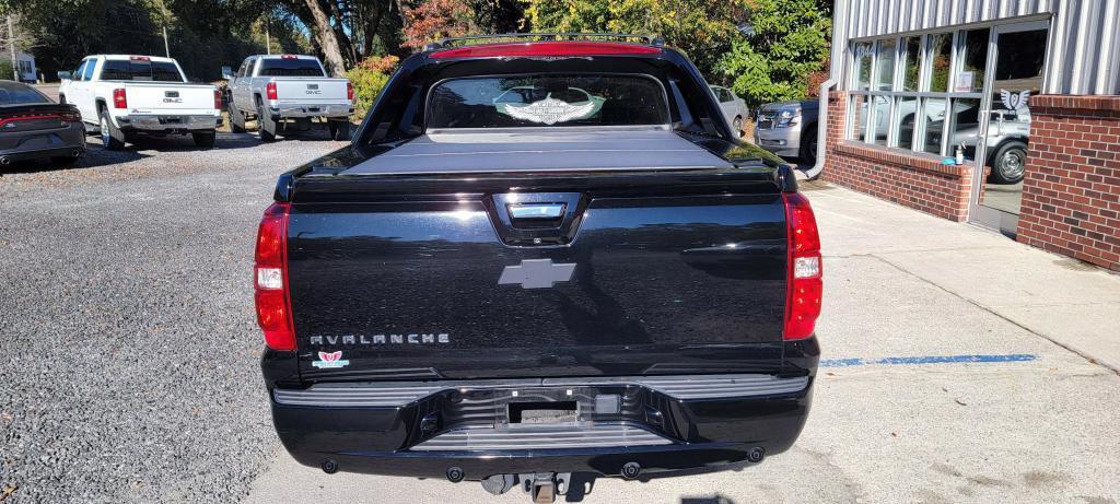 used 2013 Chevrolet Avalanche car, priced at $14,500