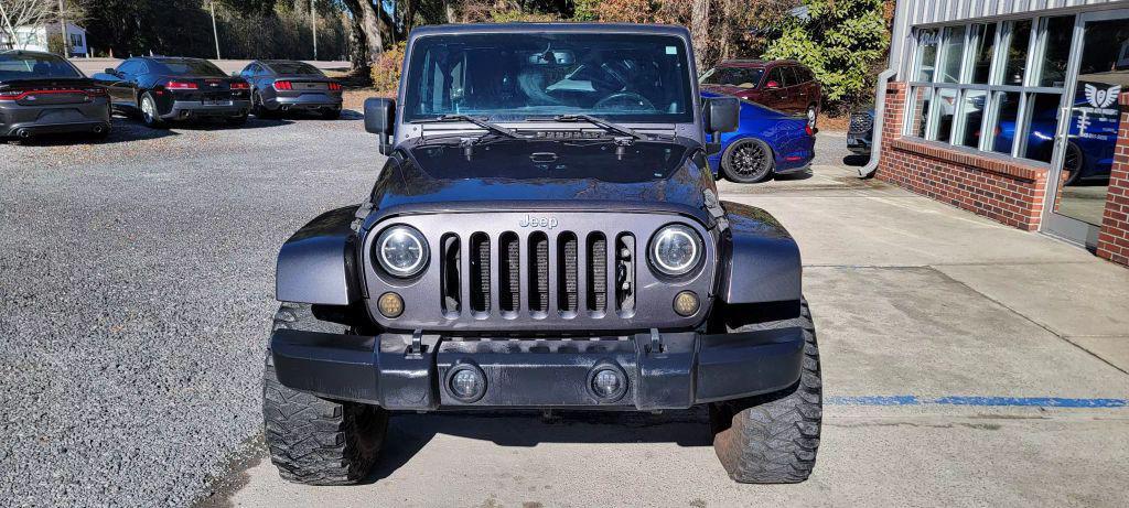 used 2014 Jeep Wrangler Unlimited car, priced at $13,990