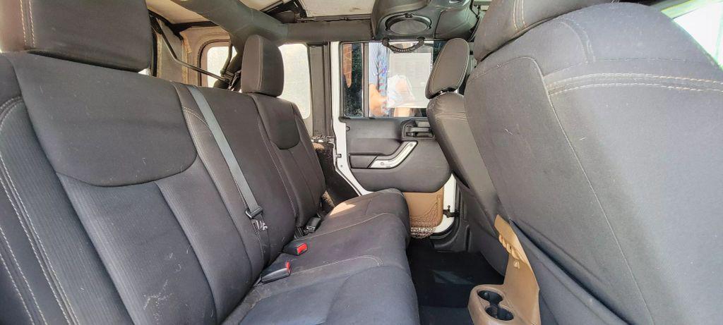 used 2013 Jeep Wrangler Unlimited car, priced at $11,990