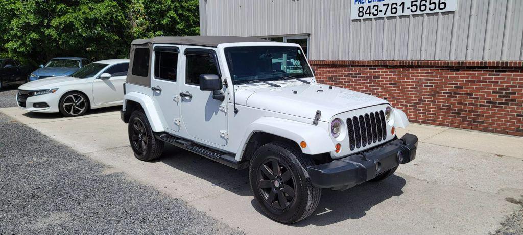 used 2013 Jeep Wrangler Unlimited car, priced at $11,990