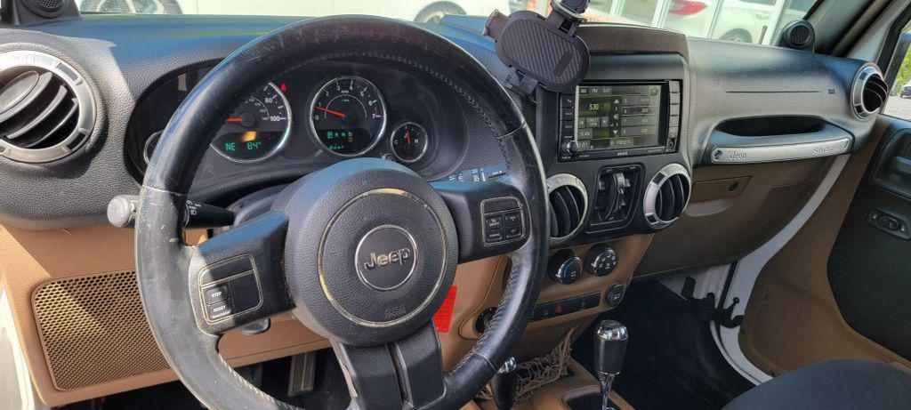 used 2013 Jeep Wrangler Unlimited car, priced at $11,990