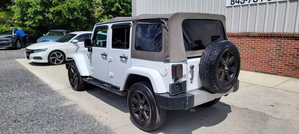 used 2013 Jeep Wrangler Unlimited car, priced at $11,990